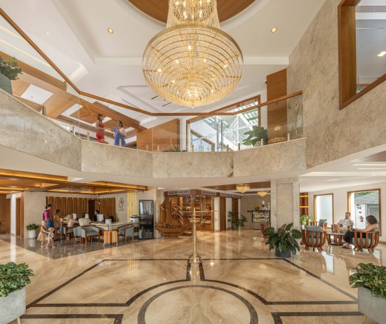 Elegant lobby with high ceiling at the Best Luxury Resort in Munnar, Grand Cliff Resort, creating a 