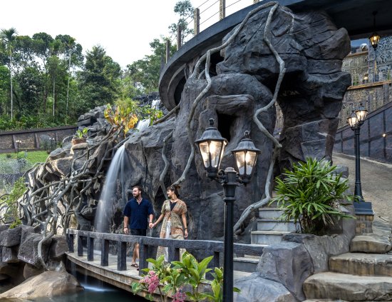 Exterior view of the Best 5-star Resort in Munnar, Grand Cliff Resort, with a stunning waterfall in 