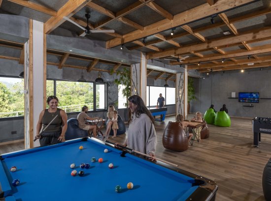 Fun indoor games at the Grand Cliff Resort, including table tennis, pool, and board games.